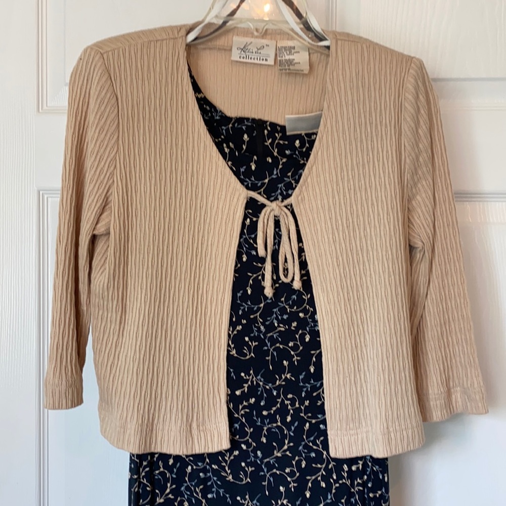 Sleeveless dress with 3/4 sleeve sweater
